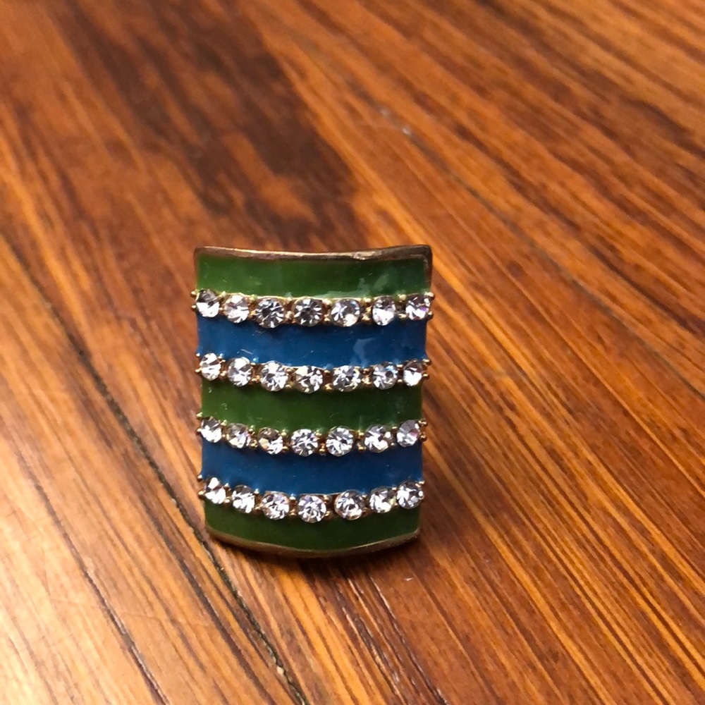 Green and blue golden ring with diamonds
